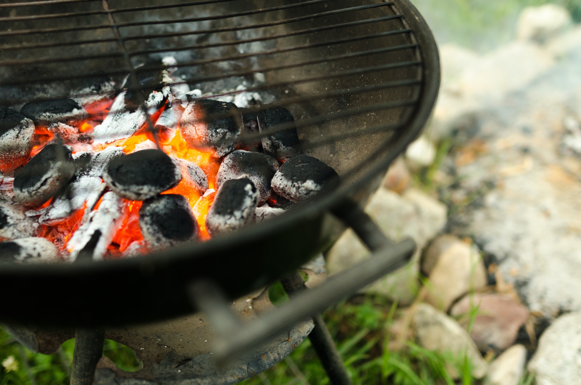 Charcoal grill with red hot coals